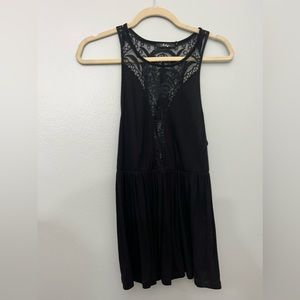 S BKE Boutique black flowy tank with sheer lace details